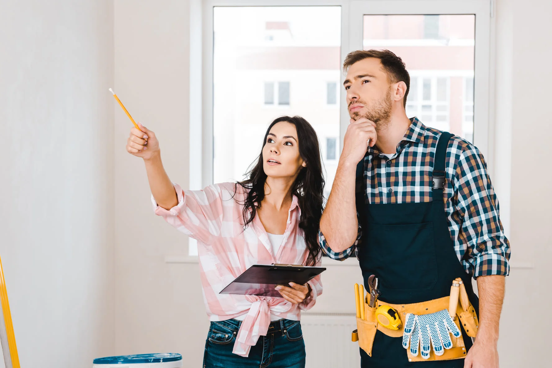 couple-discussing-home-improvement-project couple-discussing-home-improvement-project