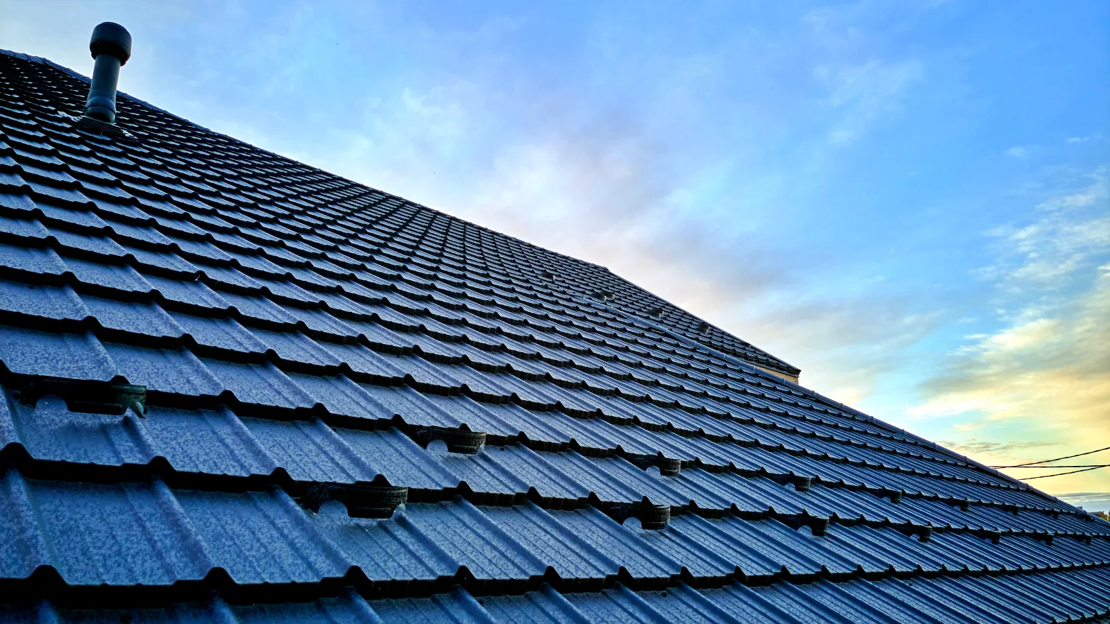 0_roof-tiles-on-a-home-under-a-cloudy-sky-2026-03-17-05-05-46-utc Roofing in Concord