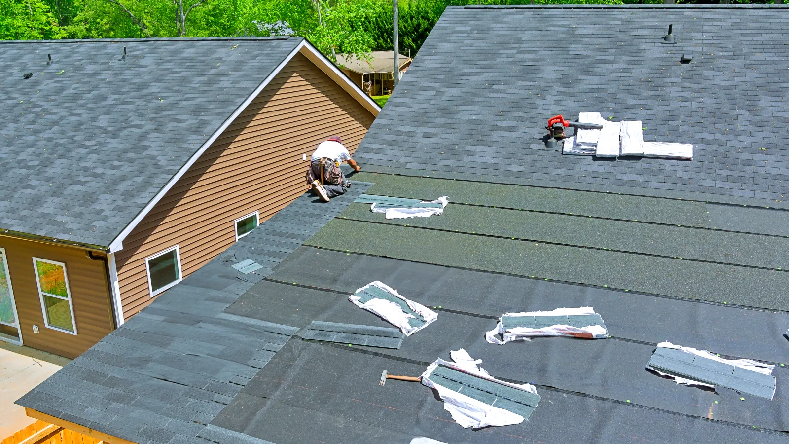 0_roofer-repairing-shingles-on-suburban-home-roof-2026-03-25-00-37-24-utc Maintenance and inspections
